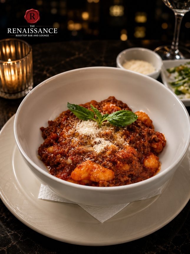 Braised ragù gnocchi with shaved parmesan
